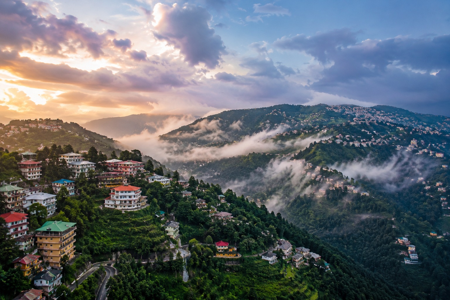 Panoramic view of Mussoorie with misty hills, mountain homes, and changing weather conditions.