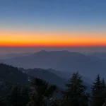 Winterline in Mussoorie visible above the hills during sunset