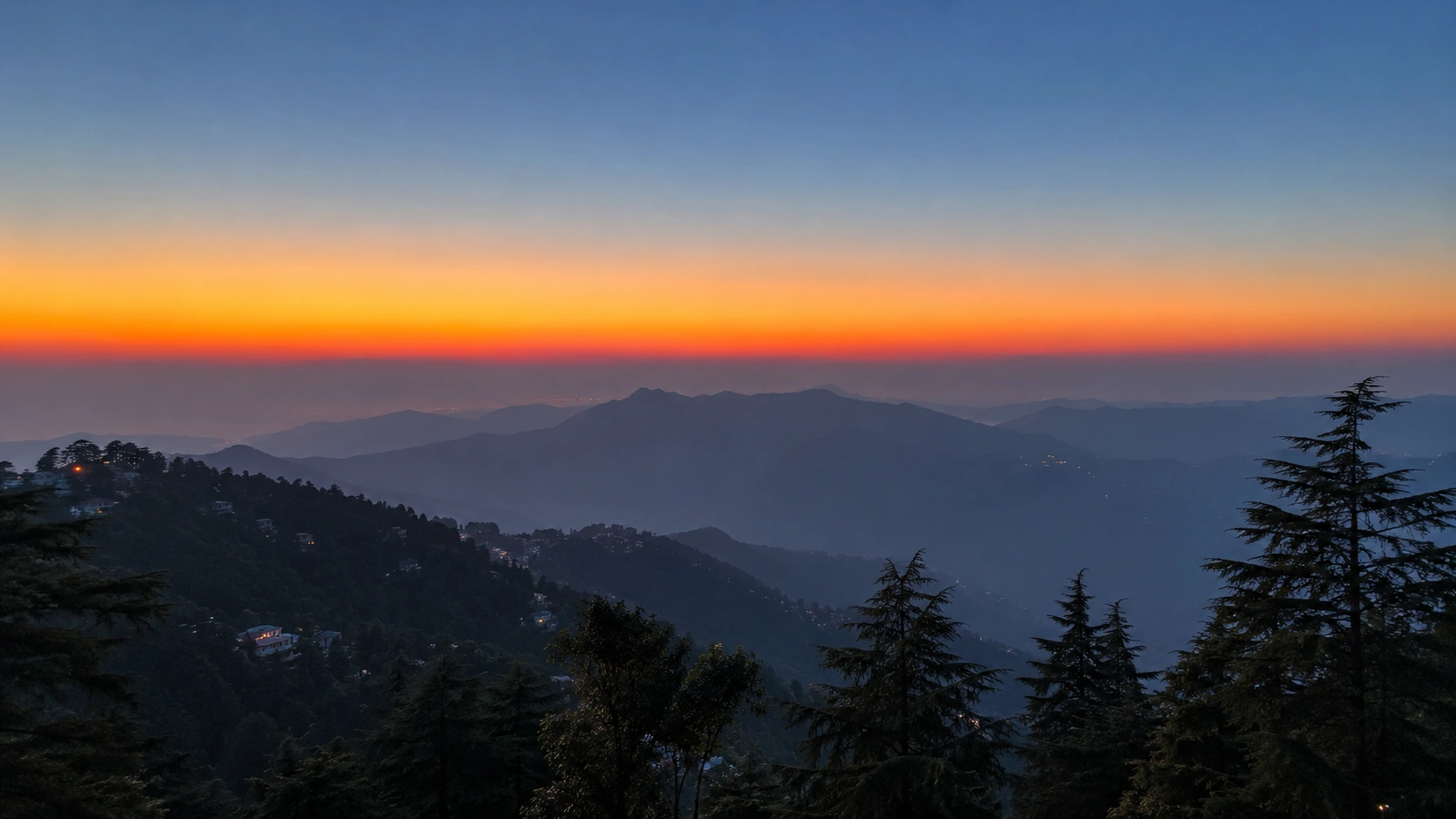 Winterline in Mussoorie visible above the hills during sunset